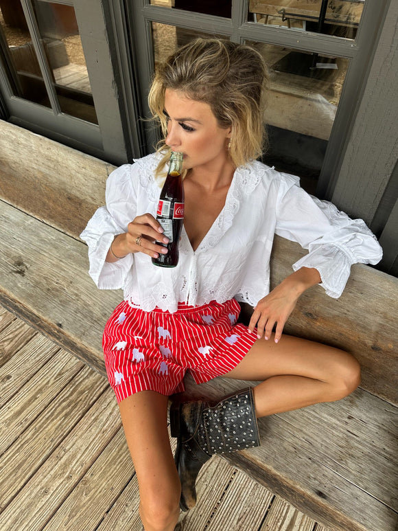 Red and white striped GAMEDAY boxers with white embroidery of the UGA mascot on the front and back. The boxers feature pockets and an elastic waistband.